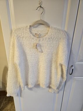 Hem And Thread Sweater